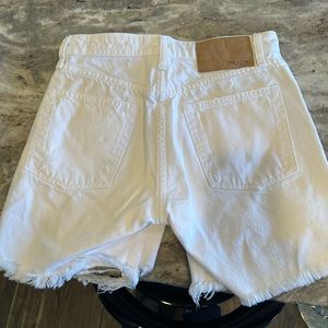 White Rag n bone shorts. Buttons in front . Lovely pockets . Classy